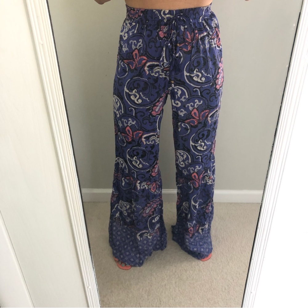Free people Hippie Boho 70's style wide flare hem pants in purple multi  print